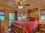 Gorgeous queen bedroom on the main, with deck access